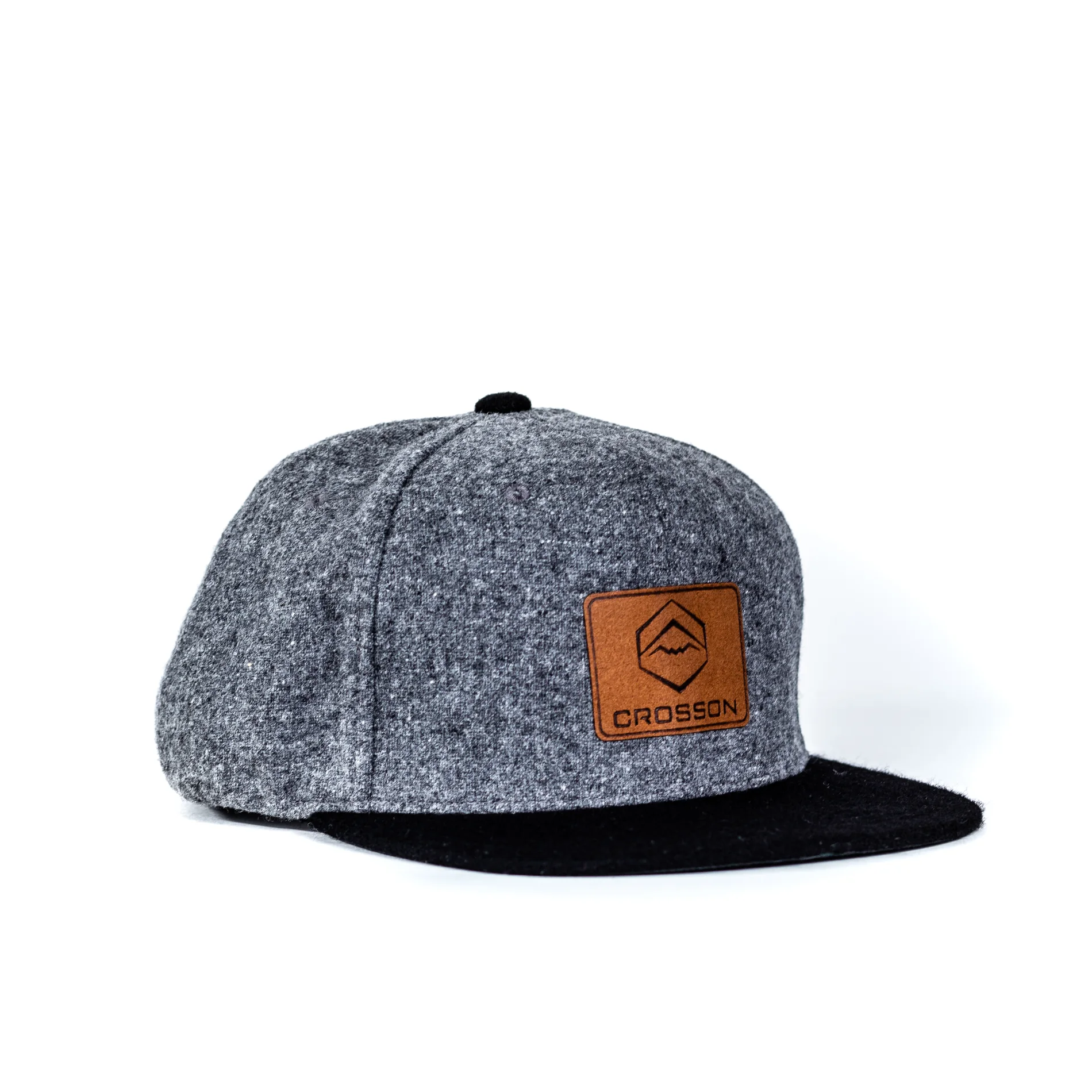 Crosson Ski cap with leather patch photographed on a white background