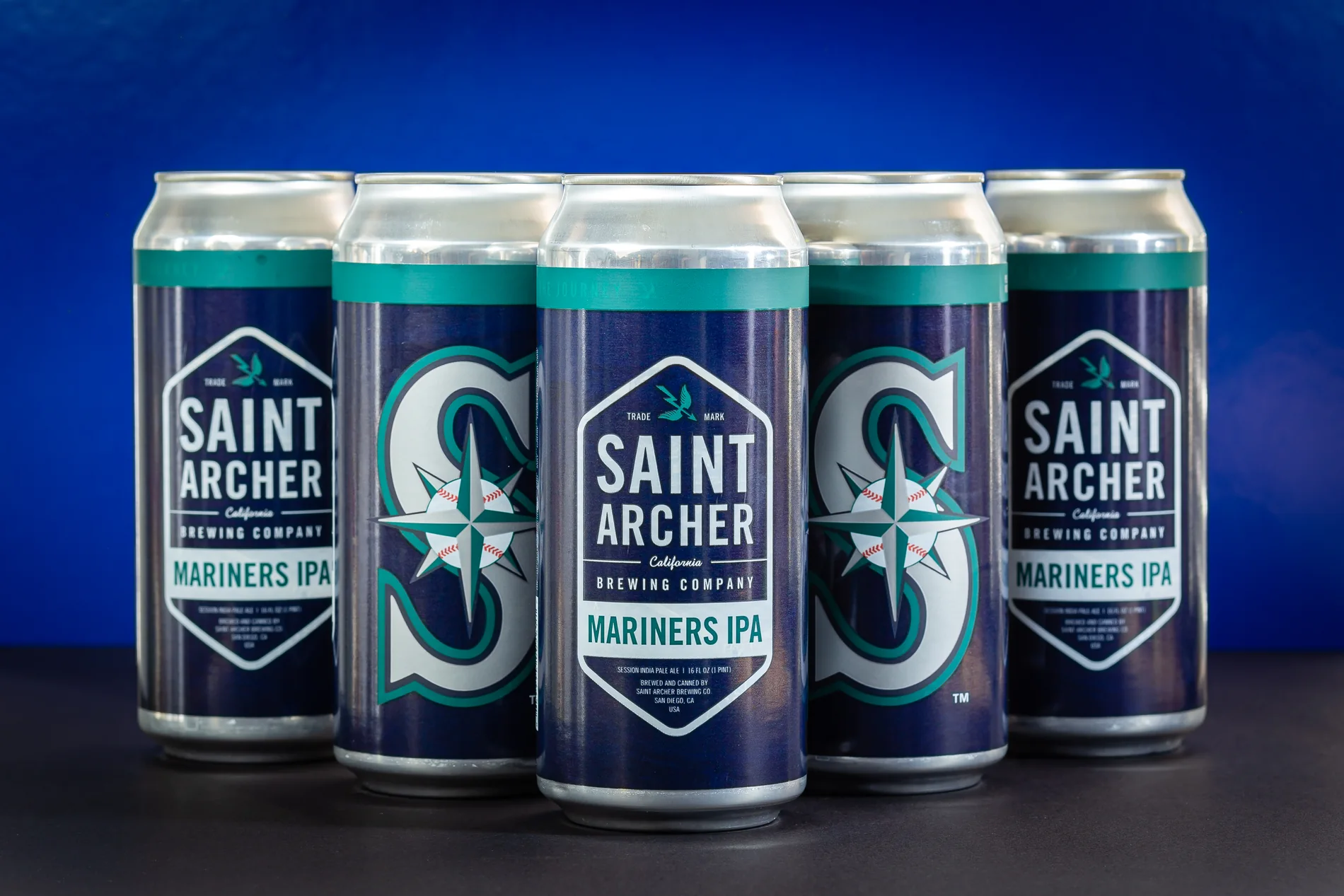 Saint Archer IPA cans in a studio setup